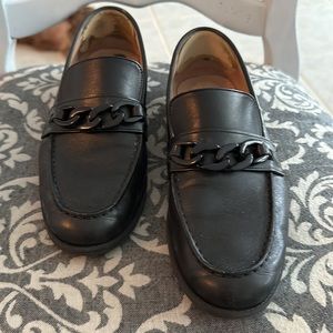 Cole Haan Grand 360 black genuine leather loafers.